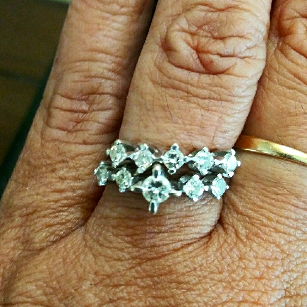 18k white gold wedding ring.